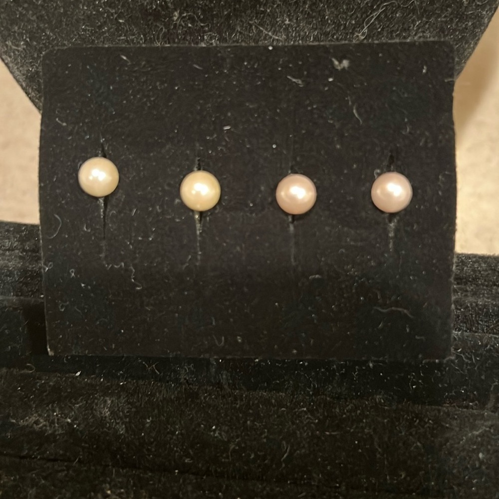 Two sets of pearl earrings